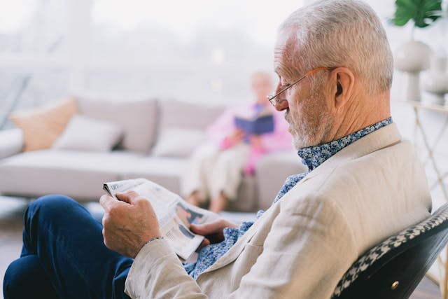 senior man reading a morning newspaper