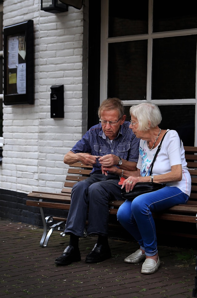 older couple looking at a phone together